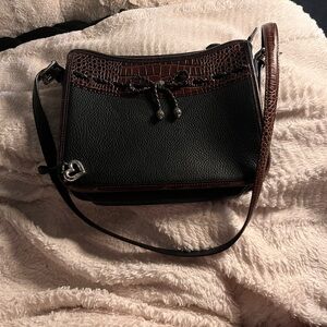 Brown and black leather shoulder bag with adjustable strap